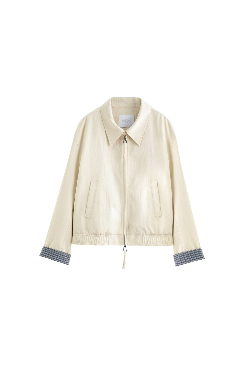 Flat lay of cream jacket with inner lining