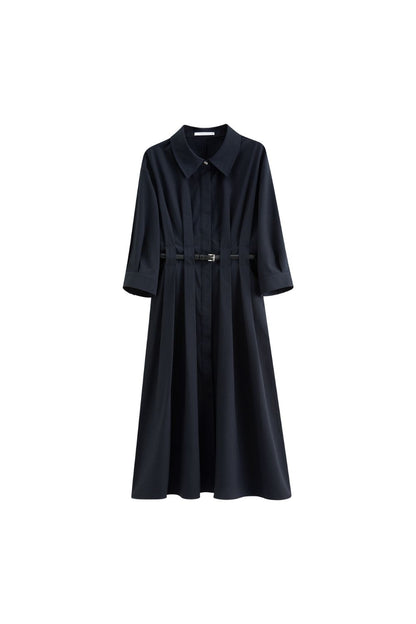 Flat lay of black belted midi dress with long sleeves