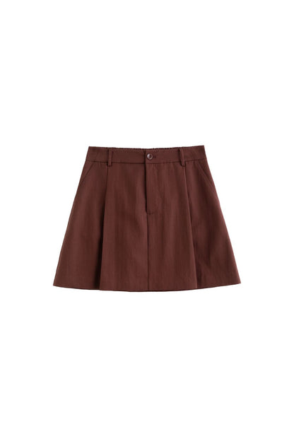 Flat lay of brown A-line skirt