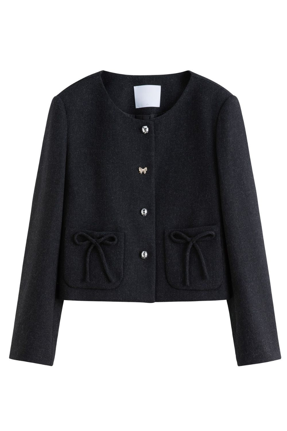 Flat lay of black cropped jacket with buttons and flap pockets