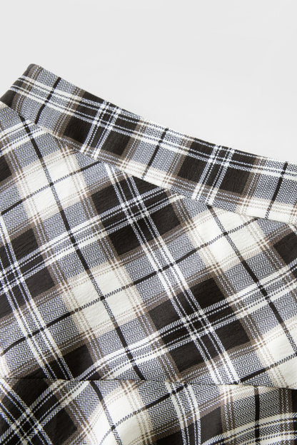 Close-up of plaid fabric pattern in neutral tones