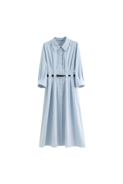 Flat lay of light blue belted midi dress with long sleeves