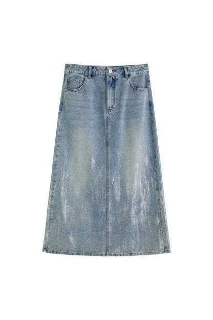 Flat lay of light blue A-line denim skirt