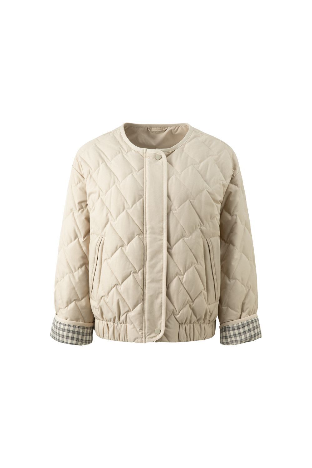 Flat lay of beige quilted jacket