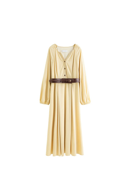 Flat lay of yellow long-sleeve belted dress